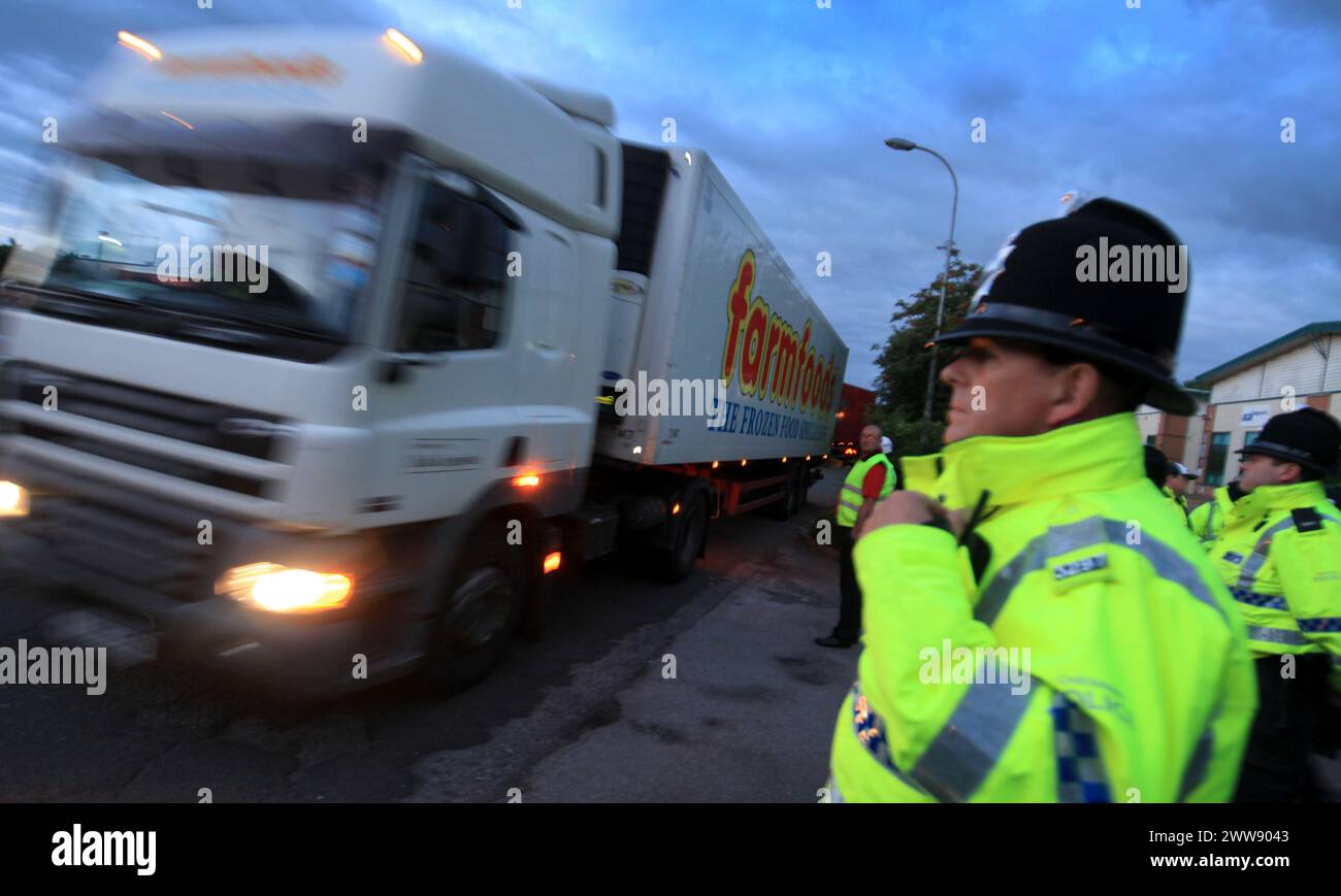 06/08/12 ..Police direct  a Farmfoods lorry away from the company's distribution centre in Warrington...Demanding a higher price for their milk, dairy Stock Photo