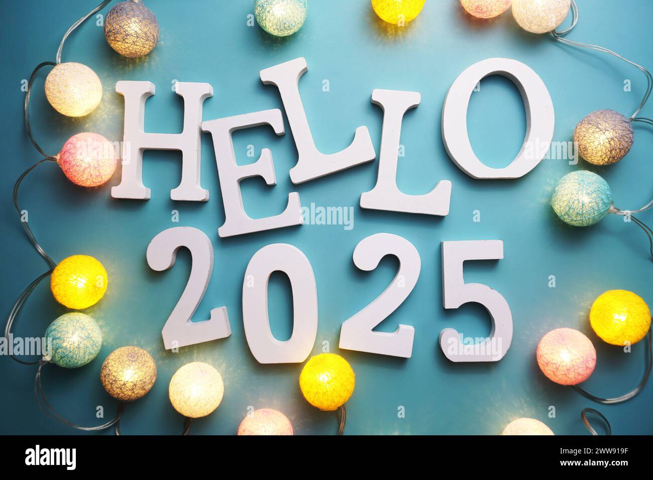 Hello 2025 alphabet letter with cotton ball LED decoration on blue