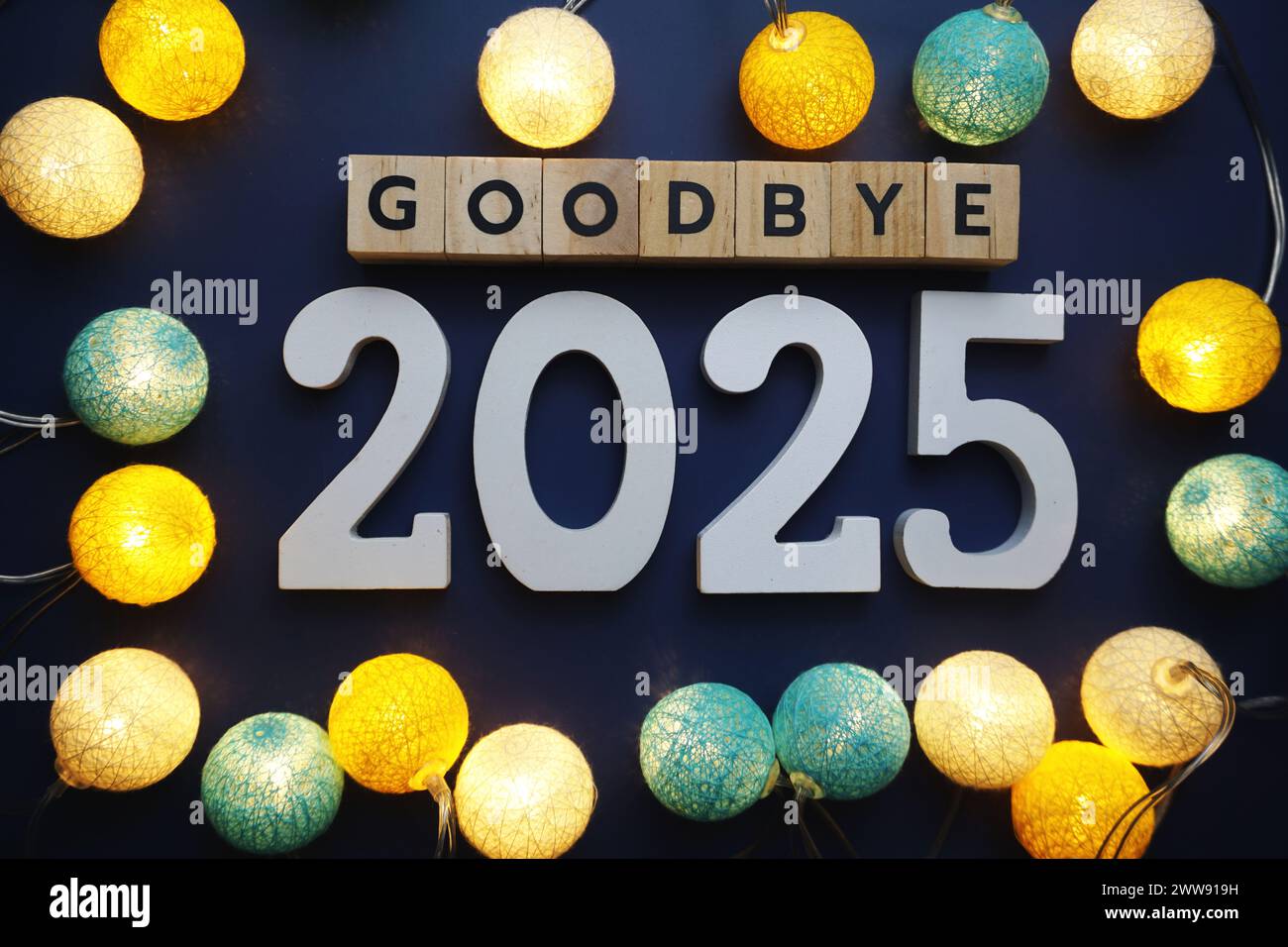 Goodbye 2025 alphabet letter with cotton ball LED decoration on blue