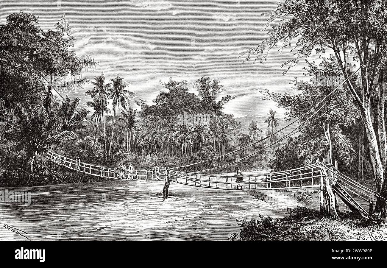 Rattan bridge over a river at Bangko, Sumatra Island. Indonesia. Drawing by Theodore Alexander Weber (1838 - 1907) Across the island of Sumatra 1877 by Daniel David Veth (1850 - 1885) Le Tour du Monde 1880 Stock Photo