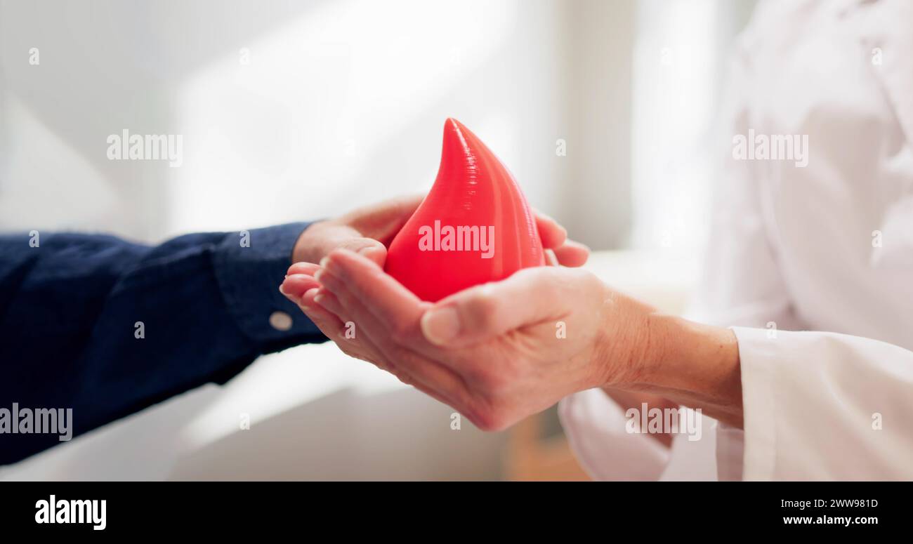 Blood Donation In Laboratory. Doctor And Patient Stock Photo