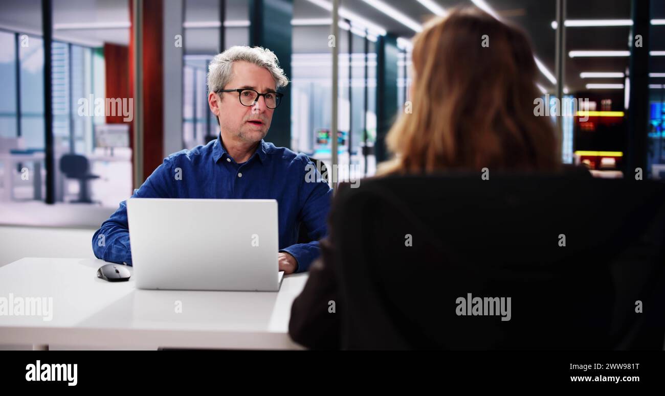 Office Interview Conversation. Two Business People Talking Stock Photo