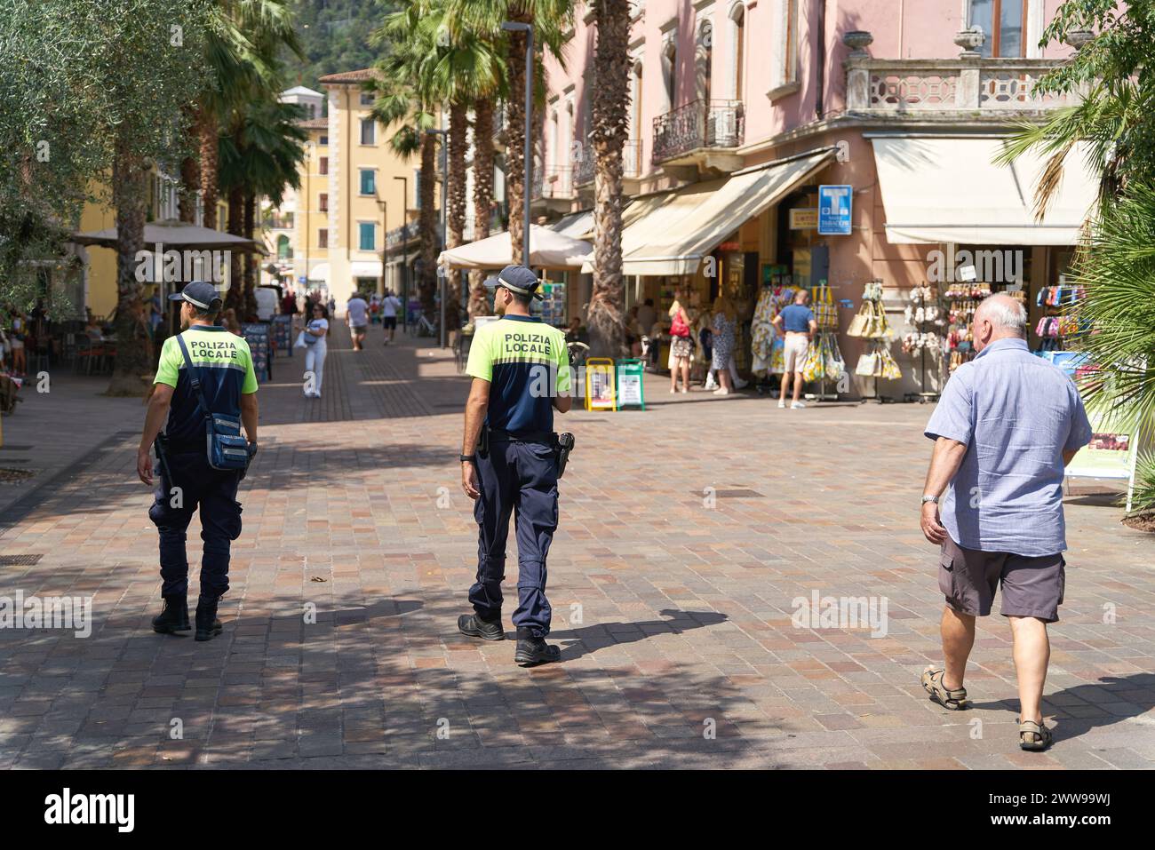Police presence for public safety in the popular vacation resort of Riva del Garda on Lake Garda in Italy Stock Photo