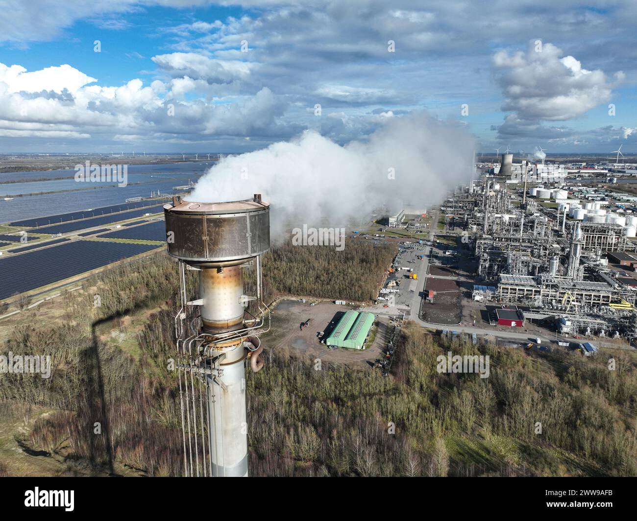 Smoke stack at a large refinery in Moerdijk, The Netherlands. Smoking ...