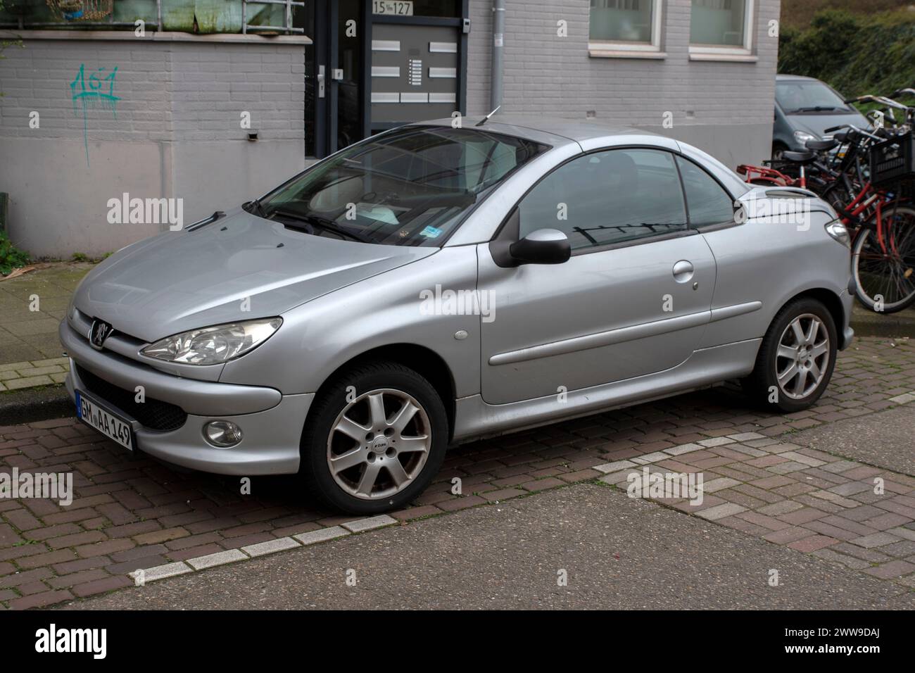 A Silver 206 CC Peugeot Car At Amsterdam The Netherlands 20-3-2024 Stock Photo