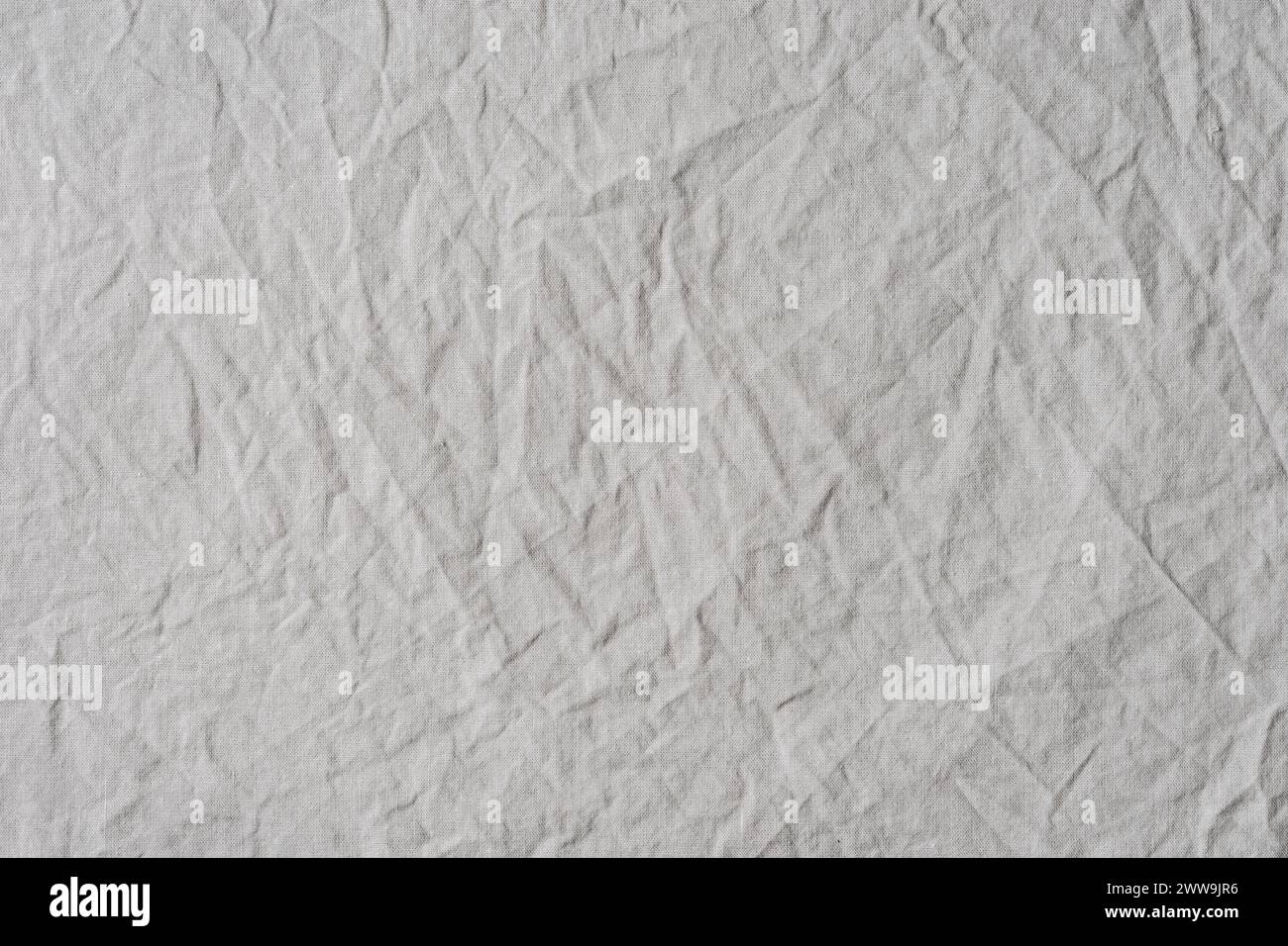 Gray crumpled natural cotton fabric, texture. Stock Photo