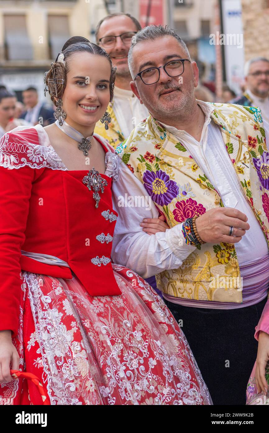 A Man and Woman Adorned in Fallas Attire Celebrating in Gandia, Valencia. Capturing the Spirit of the Fallas Festival through Traditional Dress and Jo Stock Photo