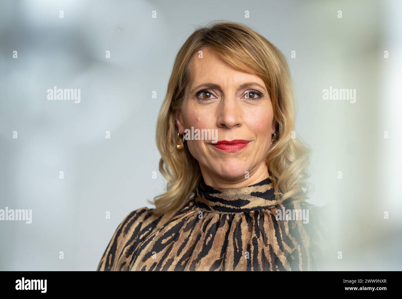 Berlin, Germany. 22nd Mar, 2024. Nadja Scholz, Program Director of Deutsche Welle, sits in her office at the broadcaster's headquarters in the capital. DW is a public-law institution and works across three media: television, radio and the internet. Credit: Monika Skolimowska/dpa/Alamy Live News Stock Photo