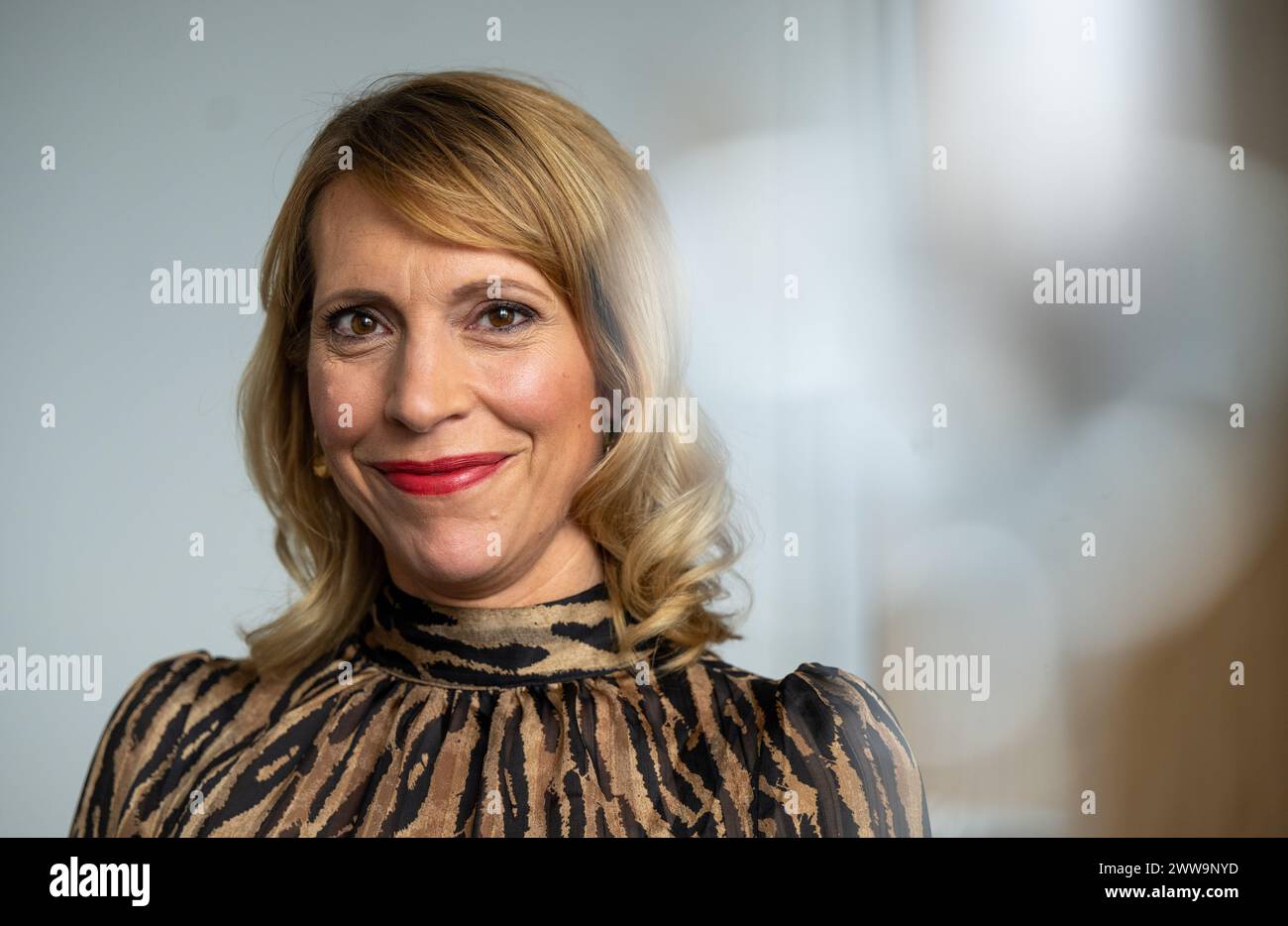 Berlin, Germany. 22nd Mar, 2024. Nadja Scholz, Program Director of Deutsche Welle, sits in her office at the broadcaster's headquarters in the capital. DW is a public-law institution and works across three media: television, radio and the internet. Credit: Monika Skolimowska/dpa/Alamy Live News Stock Photo