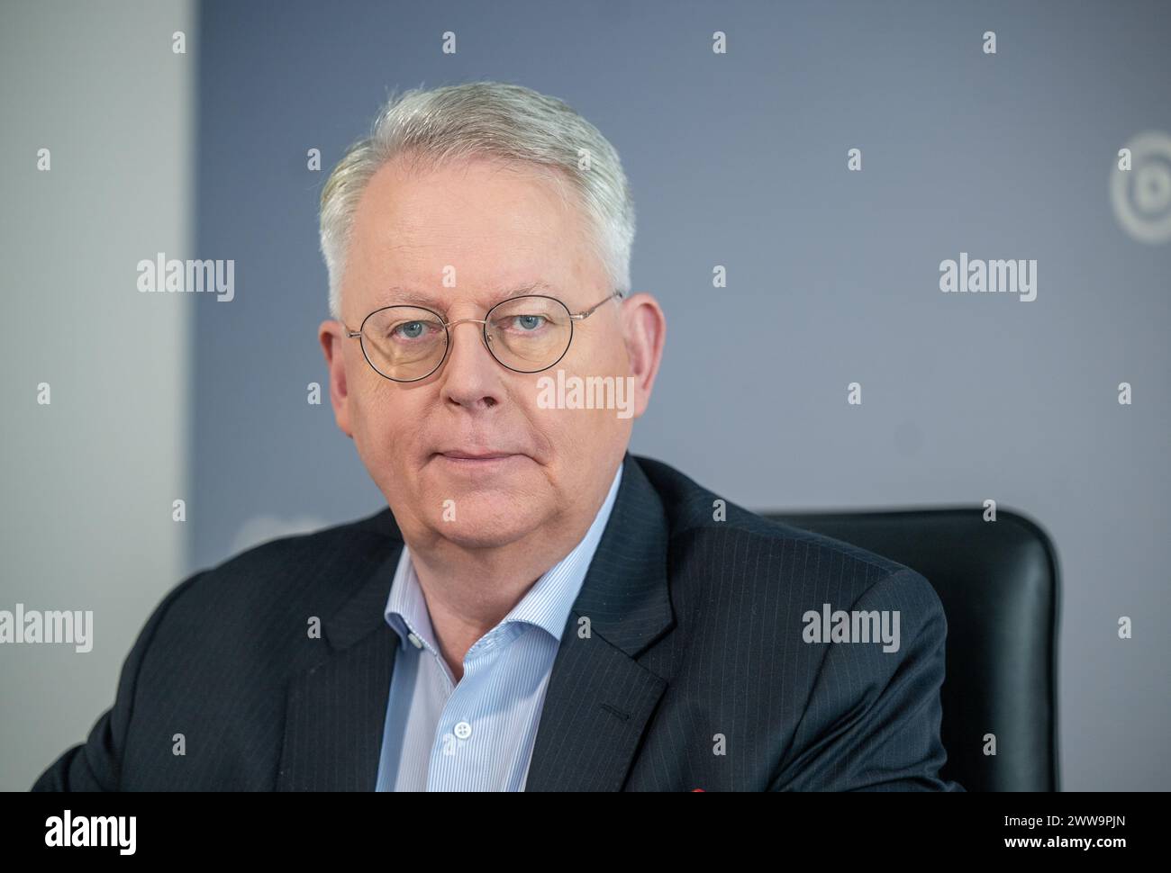 Berlin, Germany. 22nd Mar, 2024. Peter Limbourg, Director-General of Deutsche Welle, sits in his office at the broadcaster's headquarters in the capital. DW is a public-law institution and works across three media: television, radio and the internet. Credit: Monika Skolimowska/dpa/Alamy Live News Stock Photo