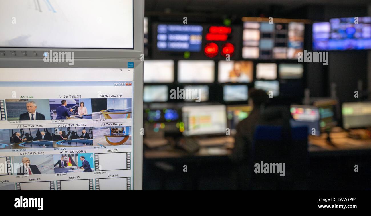 Berlin, Germany. 22nd Mar, 2024. An employee sits in the control room at the capital city headquarters of the broadcaster Deutsche Welle. DW is a public-law institution and works across three media: television, radio and the Internet. Credit: Monika Skolimowska/dpa/Alamy Live News Stock Photo