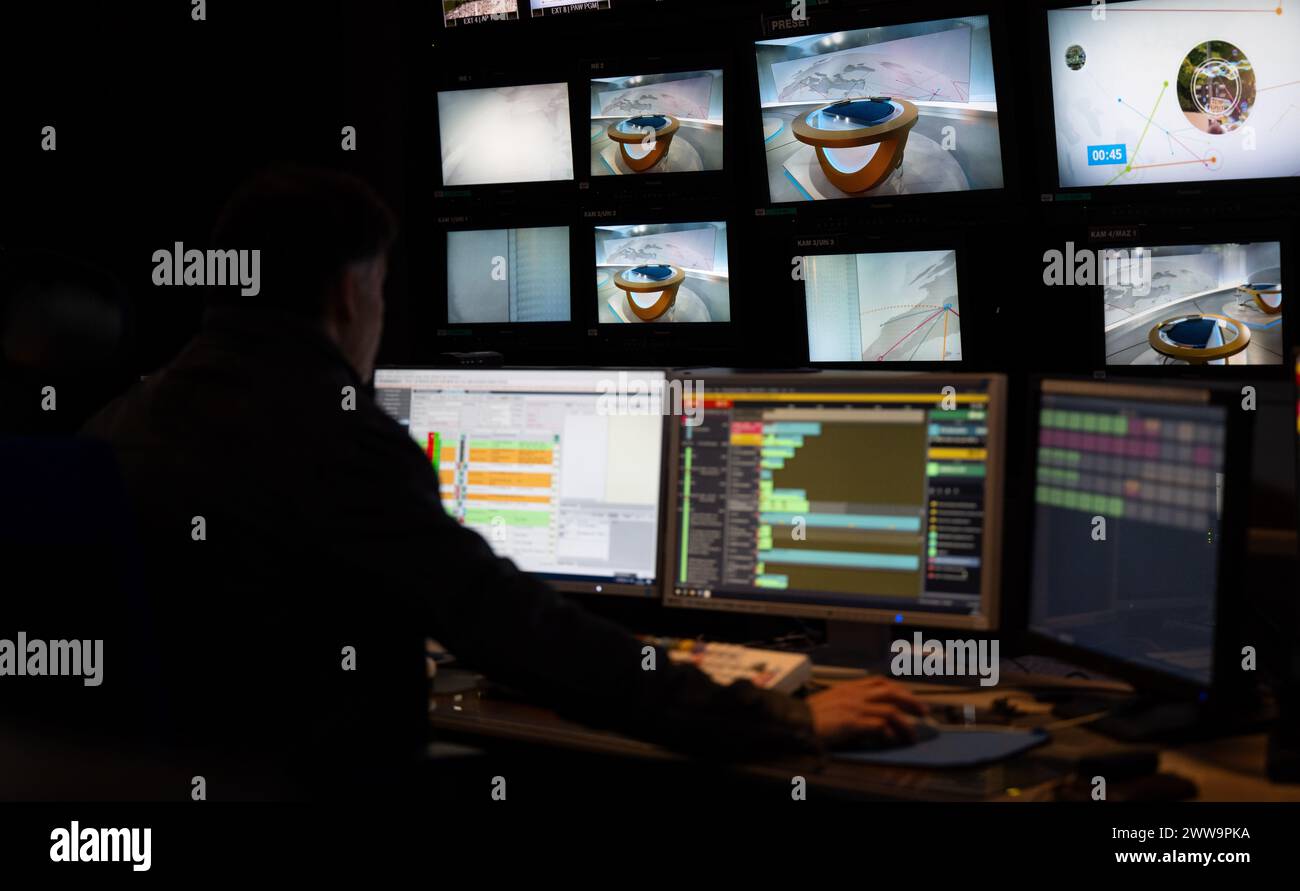 Berlin, Germany. 22nd Mar, 2024. An employee sits in the control room at the capital city headquarters of the broadcaster Deutsche Welle. DW is a public-law institution and works across three media: television, radio and the Internet. Credit: Monika Skolimowska/dpa/Alamy Live News Stock Photo