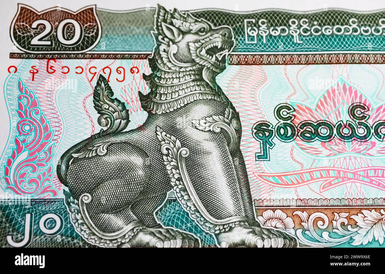 Chinthe lion burmese stylized symbol leograph  on Myanmar Kyat currency banknote from (focus on center) Stock Photo