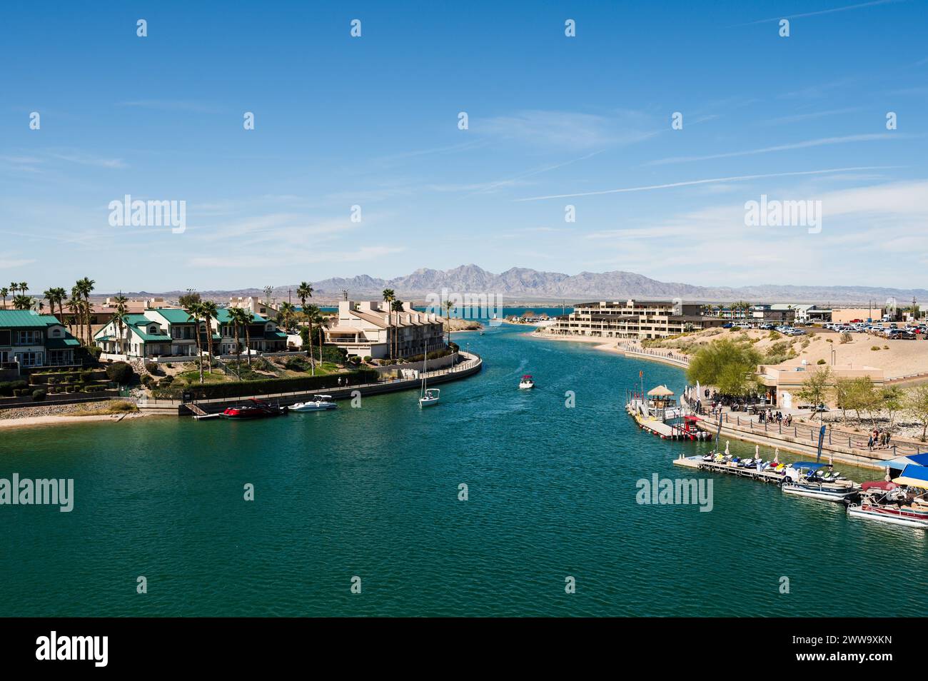 Tour boats near the old London Bridge, which was relocated from London England in the 1970’s to Lake Havasu Arizona. Stock Photo