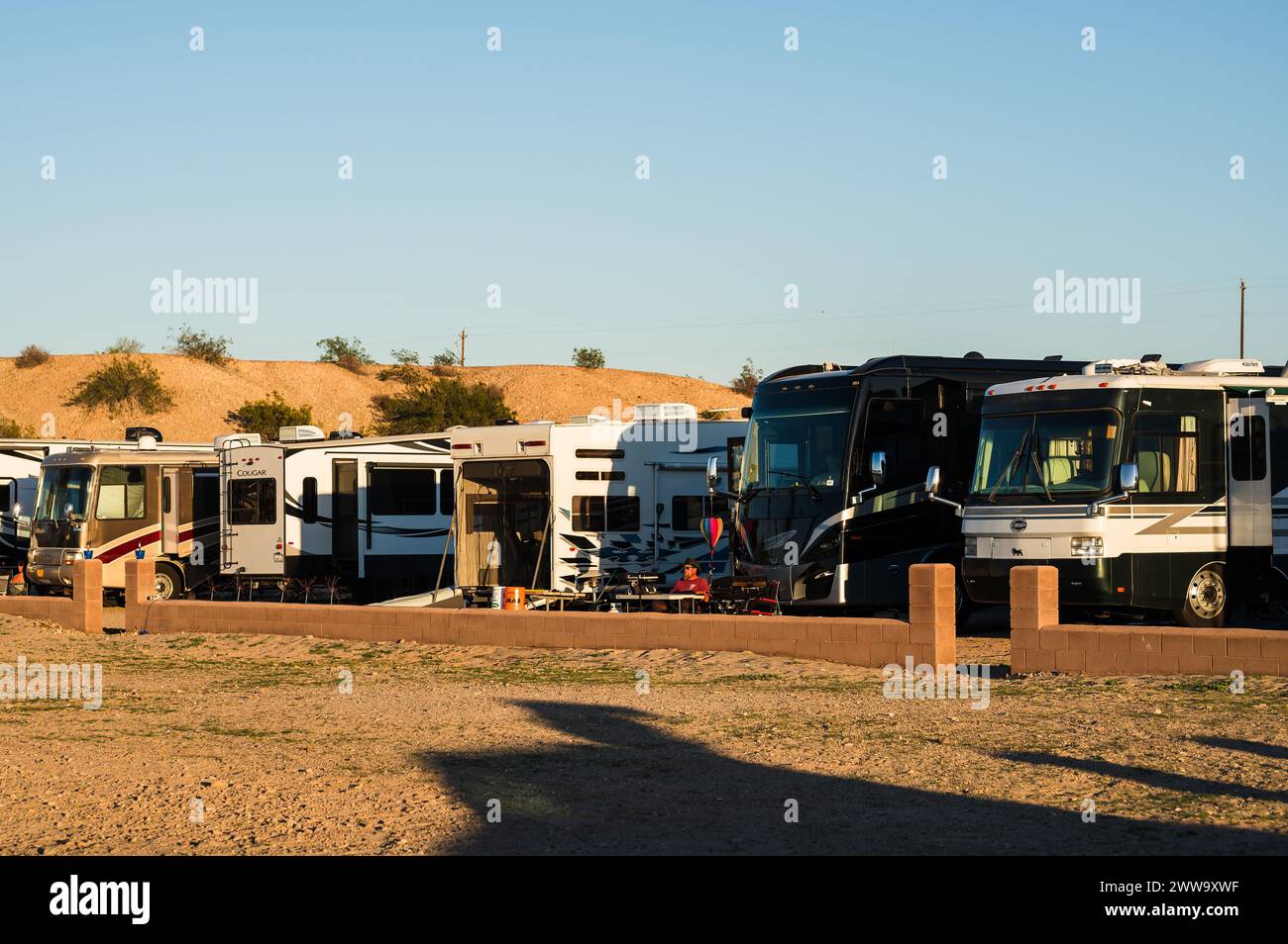 RV’s Motor Homes, and trailers parked at a campground on the shore of Lake Havasu Arizona, USA. Stock Photo