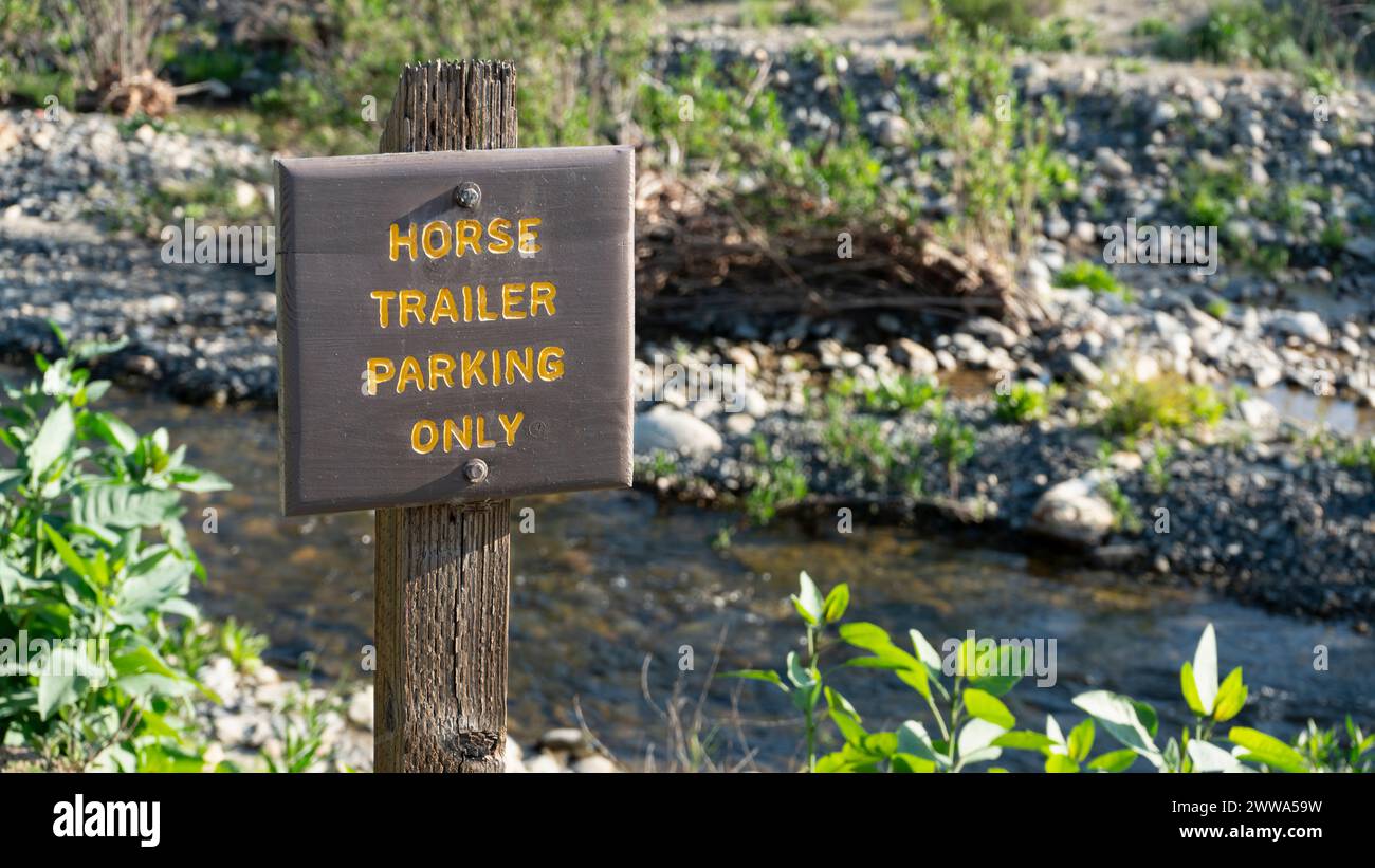 Horse trailer parking only sign in Casper Wilderness Park in southern California Stock Photo