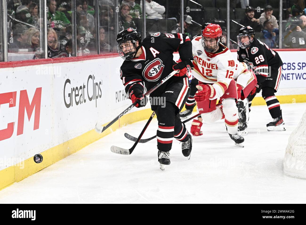 St Cloud St Huskies Defenseman Josh Luedtke 21 Fires A Puck From st-cloud-st-huskies-defenseman-josh-luedtke-21-fires-a-puck-from