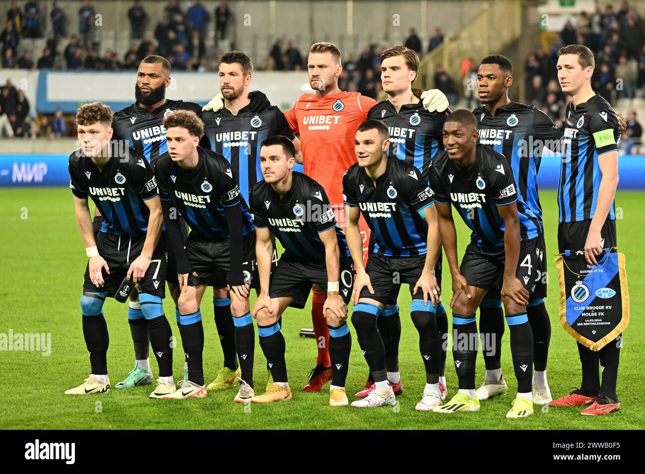players of Brugge with Igor Thiago (99) of Club Brugge, Brandon Mechele (44) of Club Brugge, goalkeeper Simon Mignolet (22) of Club Brugge, Bjorn Meijer (14) of Club Brugge, Raphael Onyedika (15) of Club Brugge, Hans Vanaken (20) of Club Brugge, Andreas Skov Olsen (7) of Club Brugge, Maxim De Cuyper (55) of Club Brugge, Hugo Vetlesen (10) of Club Brugge, Ferran Jutgla (9) of Club Brugge and Joel Ordonez (4) of Club Brugge pose for a team photo during the Uefa Conference League round of 16 - second leg game in the 2023-2024 season between Club Brugge KV and Molde FK on March 14, 2024 in Brugg Stock Photo