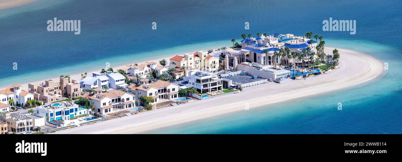 Dubai luxury villas real estate on The Palm Jumeirah artificial island panorama with beach vacation Stock Photo