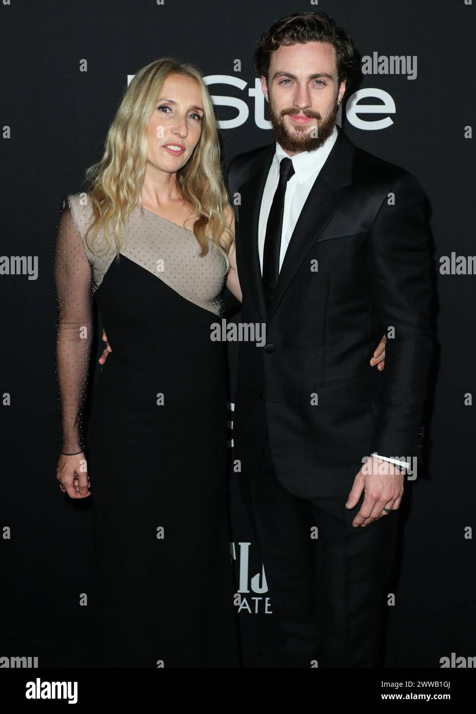 (FILE) Aaron Taylor-Johnson is the latest actor reportedly offered a license to kill and succeed Daniel Craig as the new James Bond (007). LOS ANGELES, CA, USA - OCTOBER 22: Sam Taylor-Johnson and Aaron Taylor-Johnson wearing Givenchy arrive at the InStyle Awards 2018 held at the Getty Center on October 22, 2018 in Los Angeles, California, United States. (Photo by Xavier Collin/Image Press Agency) Stock Photo