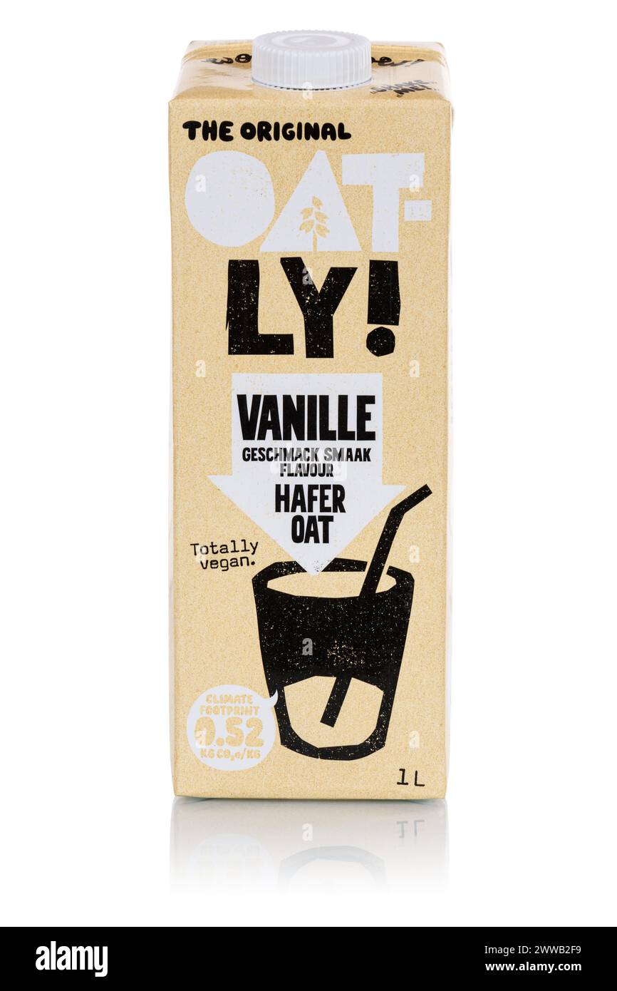 Stuttgart, Germany - March 2, 2024: Oatly vegan oat milk Vanilla flavor isolated on a white background portrait format in Stuttgart, Germany. Stock Photo