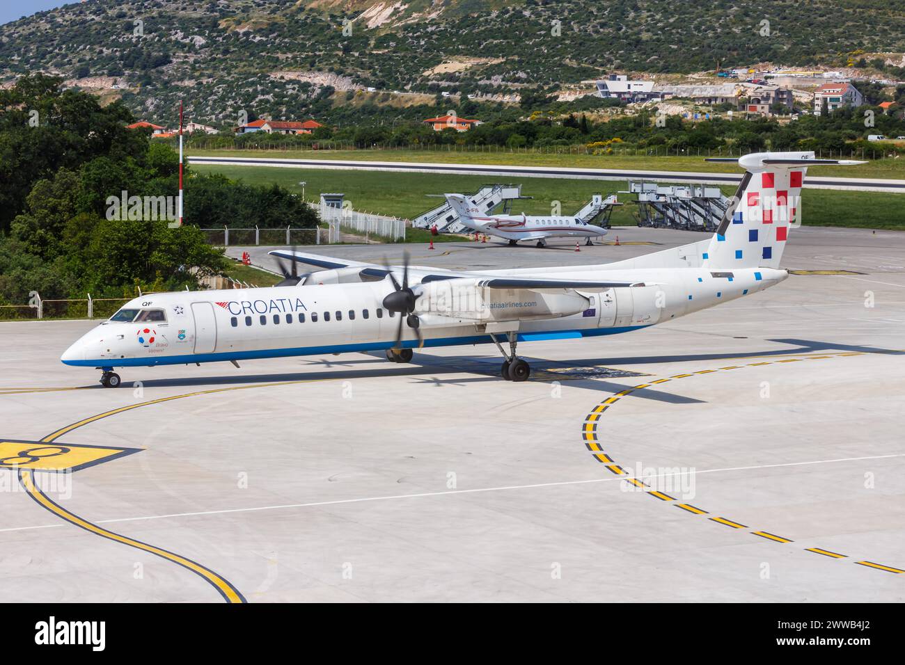 Split, Croatia - May 29, 2023: Croatia Airlines De Havilland Canada Dash 8 Q400 airplane at Split Airport (SPU) in Croatia. Stock Photo