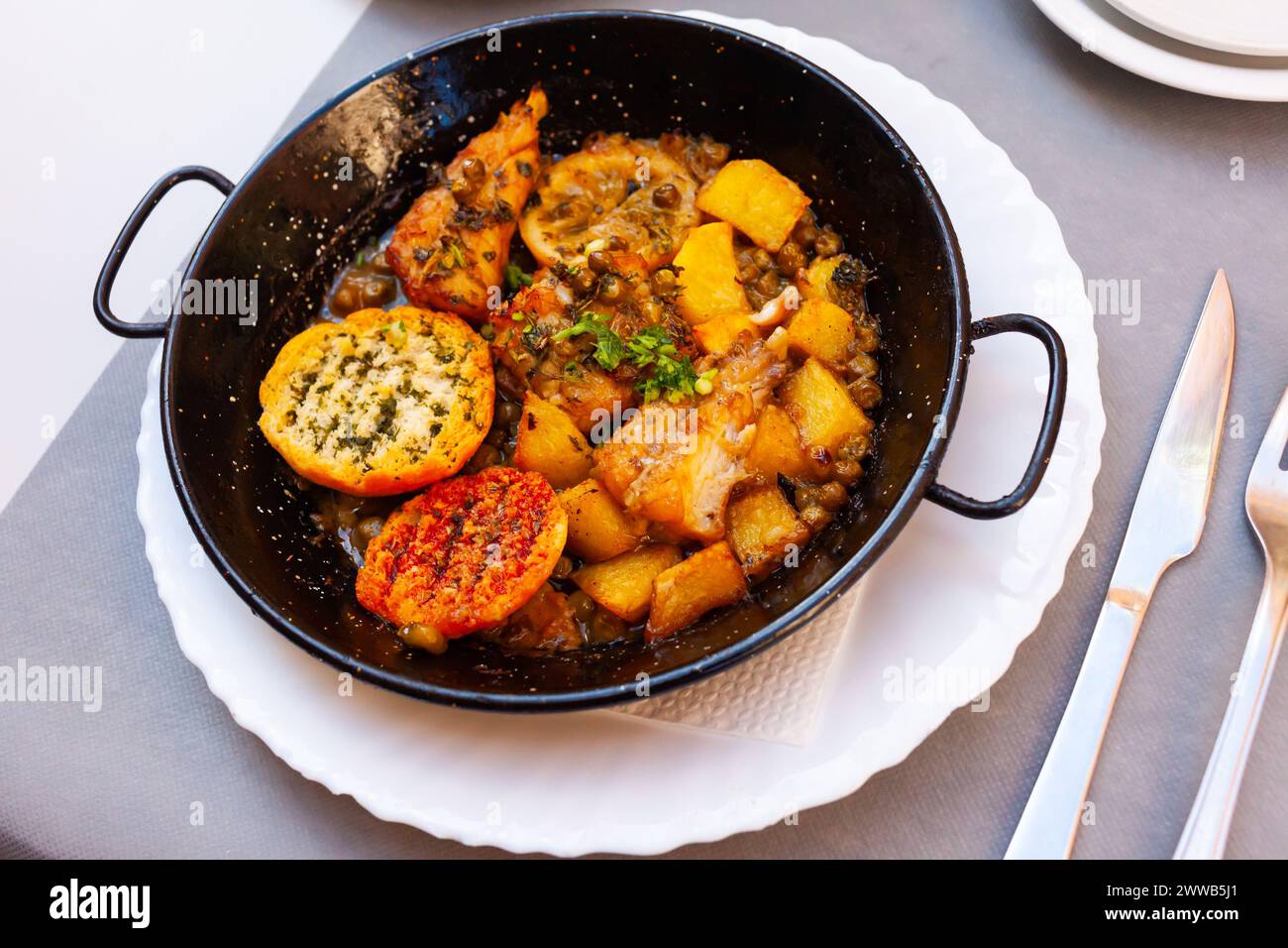 Fried monkfish with lemon Stock Photo - Alamy
