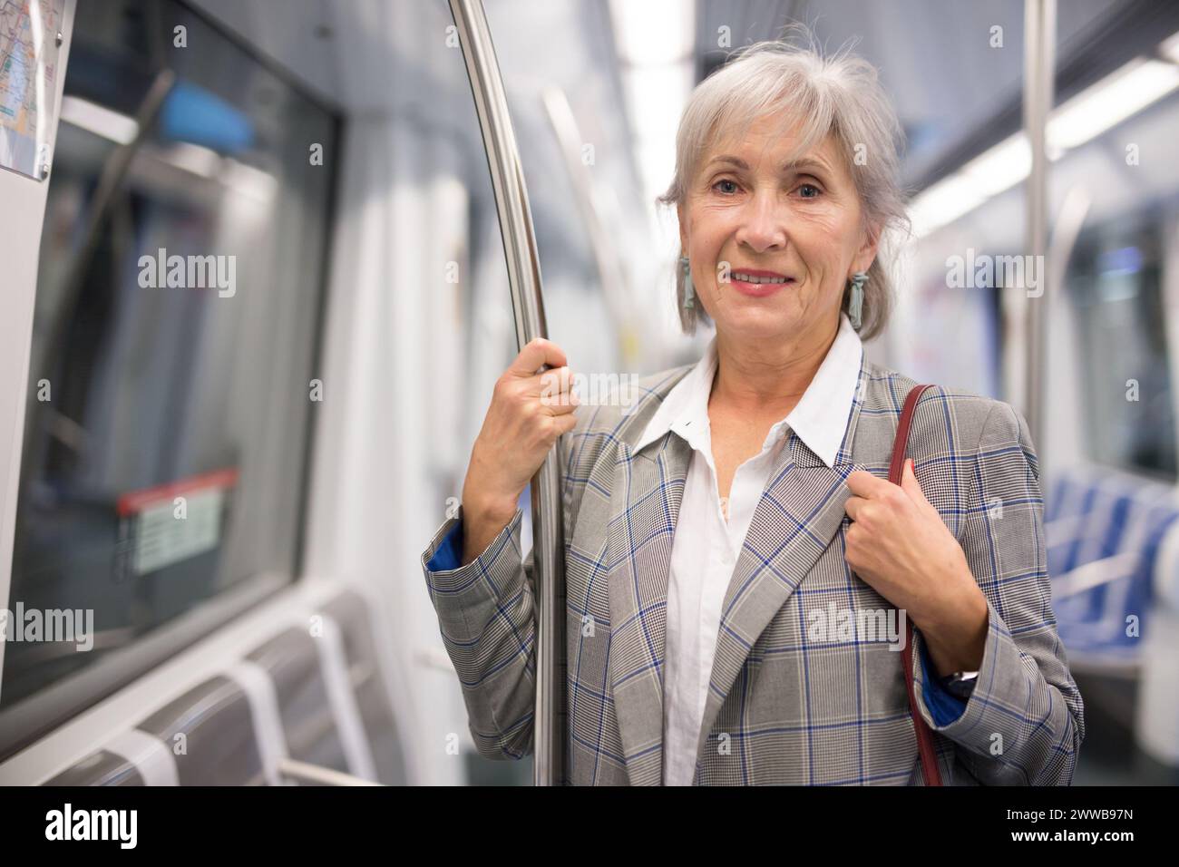 Mature woman on train hi-res stock photography and images - Alamy