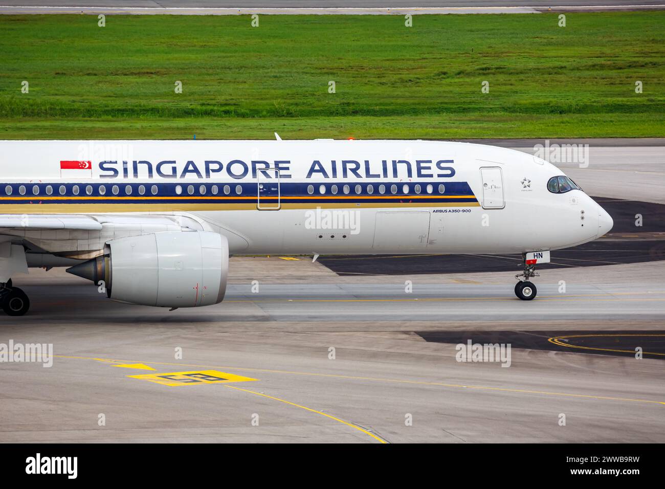 Changi, Singapore - February 3, 2023: Singapore Airlines Airbus A350-900 airplane at Changi Airport (SIN) in Singapore. Stock Photo