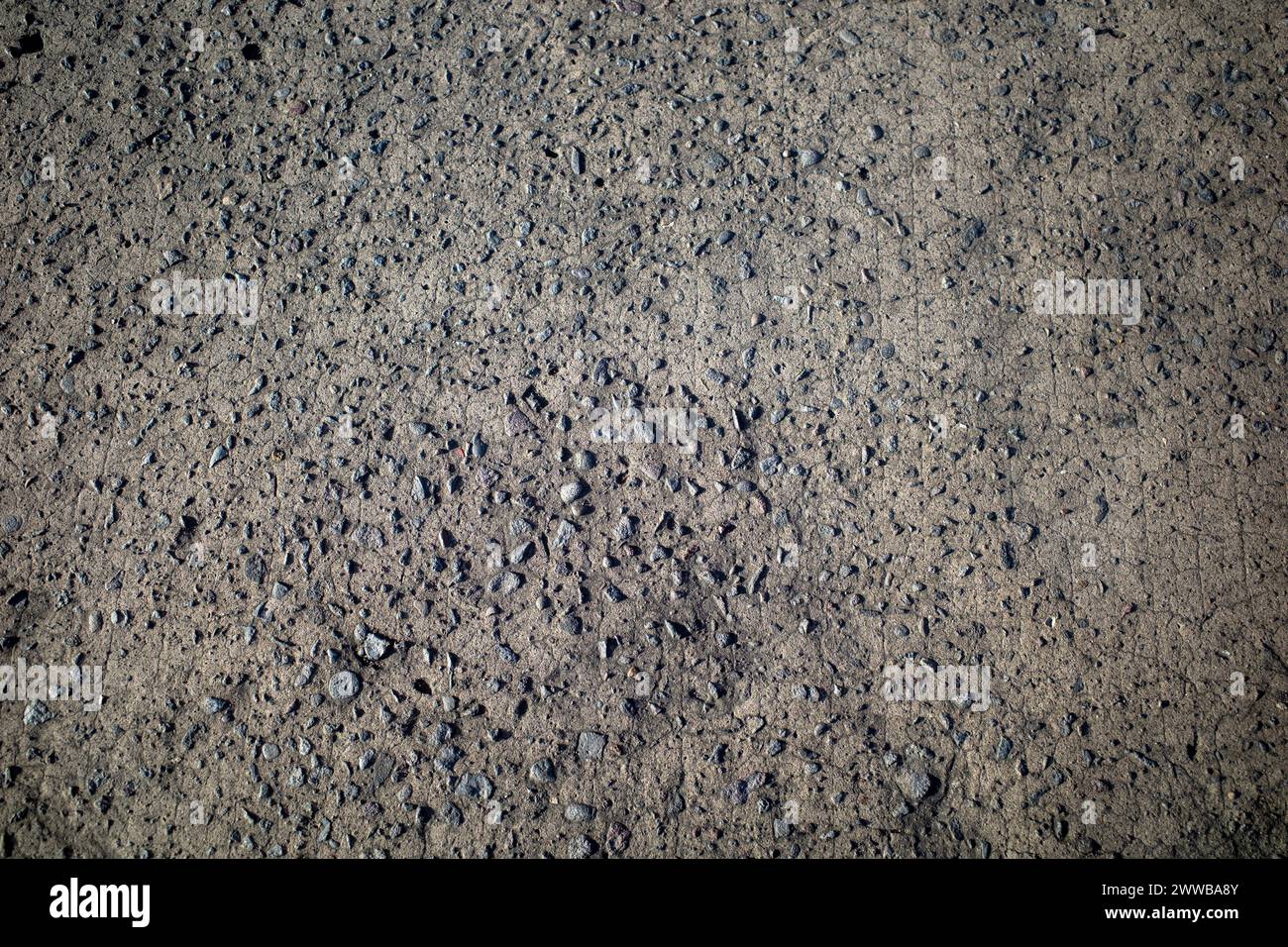 Rough asphalt surface texture for wallpaper and background. Stock Photo