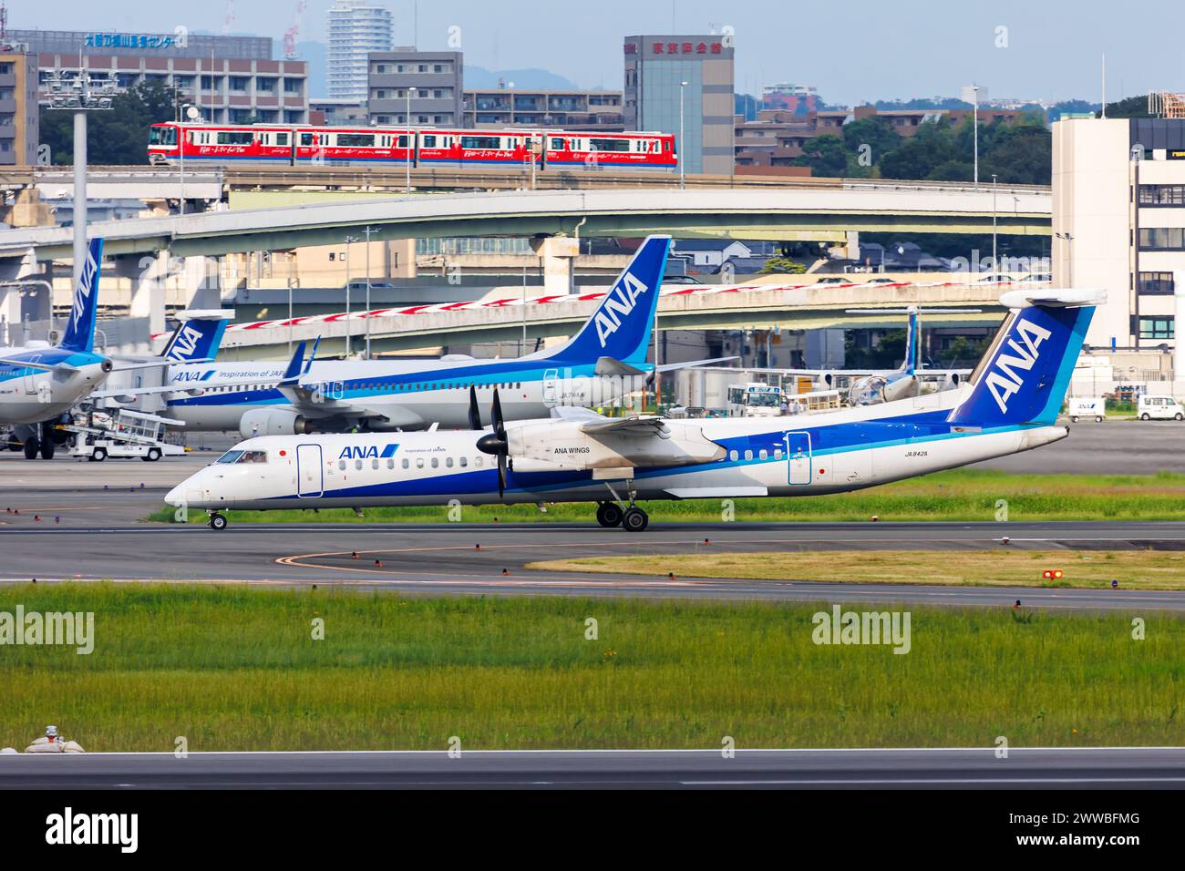 Osaka, Japan - October 1, 2023: ANA Wings Dash 8 Q400 airplane at Osaka Itami Airport (ITM) in Japan. Stock Photo