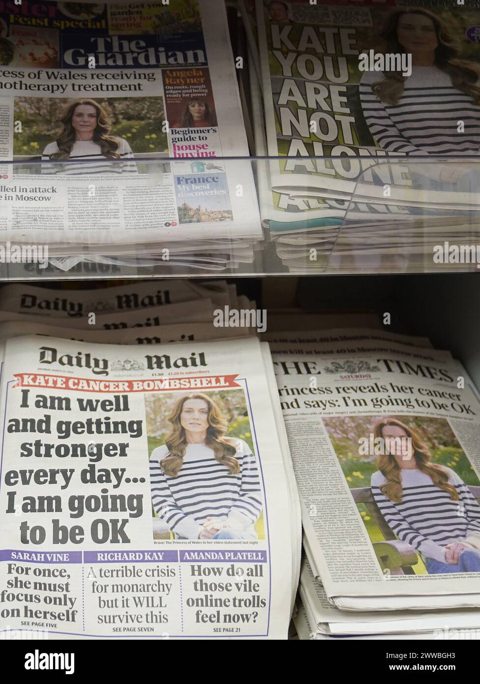Front pages of national newspapers on display at a newsagents in north London showing the news of the Princess of Wales cancer diagnosis. Picture date: Saturday March 23, 2024. Stock Photo