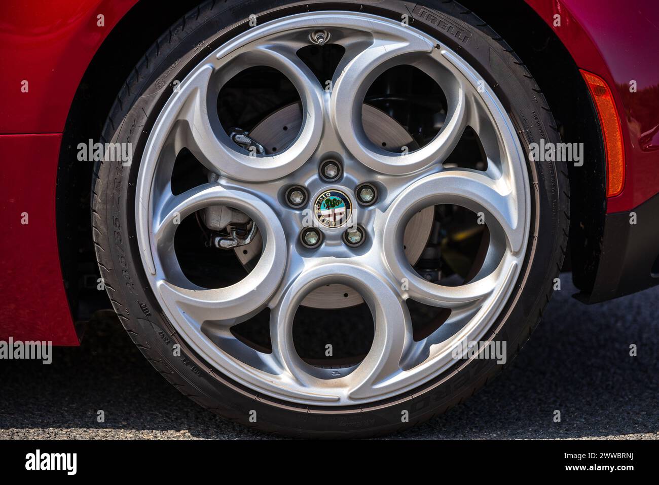 LINTHE, GERMANY - MAY 27, 2023: The aluminum rims of sports car Alfa Romeo 4C, close-up. Die Oldtimer Show 2023. Stock Photo