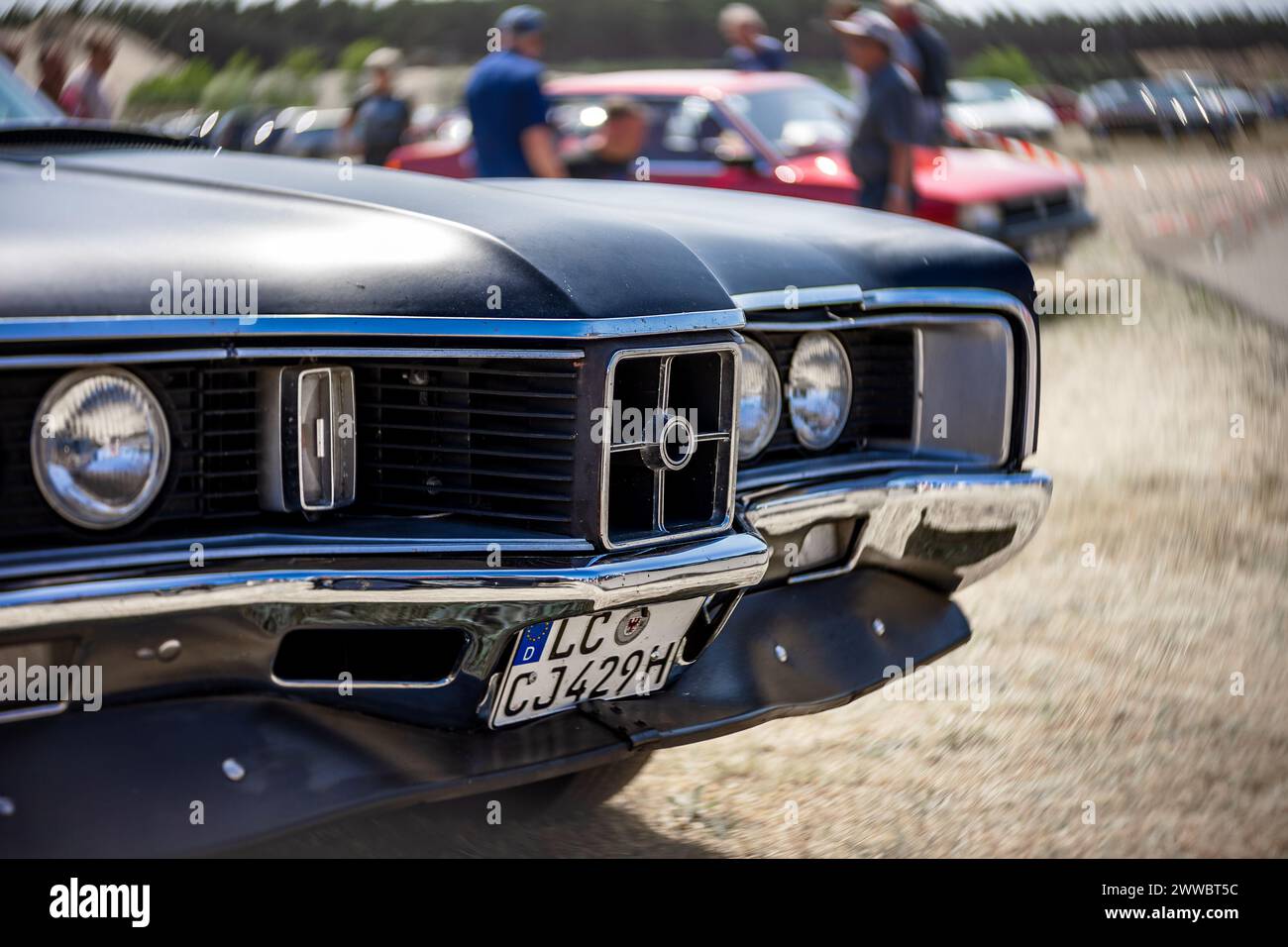 LINTHE, GERMANY - MAY 27, 2023: The detail of a muscle car Mercury Cyclone Spoiler, 1970. Art lens. Swirl bokeh. Die Oldtimer Show 2023. Stock Photo