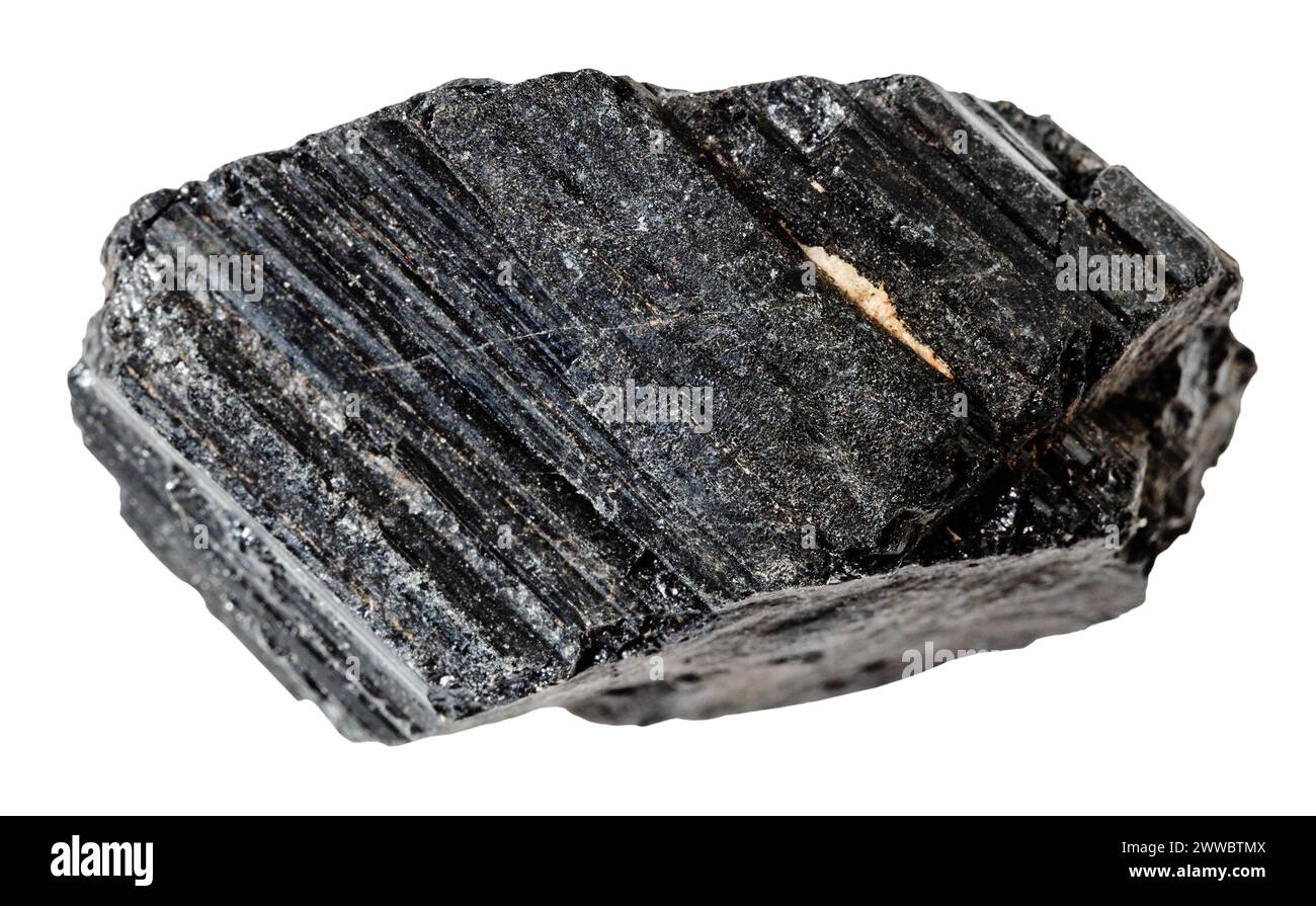 close up of sample of natural stone from geological collection - raw black tourmaline (schorl) mineral isolated on white background Stock Photo