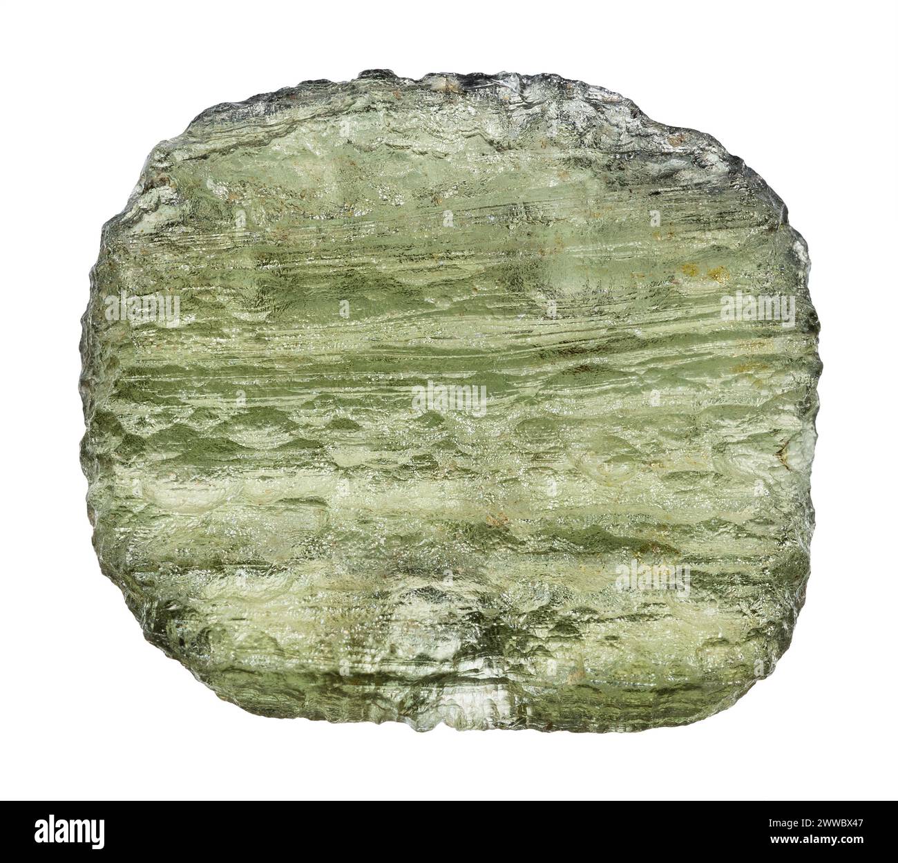 close up of sample of natural stone from geological collection - raw moldavite meteorite glass isolated on white background from from Bohemia, Czech Stock Photo