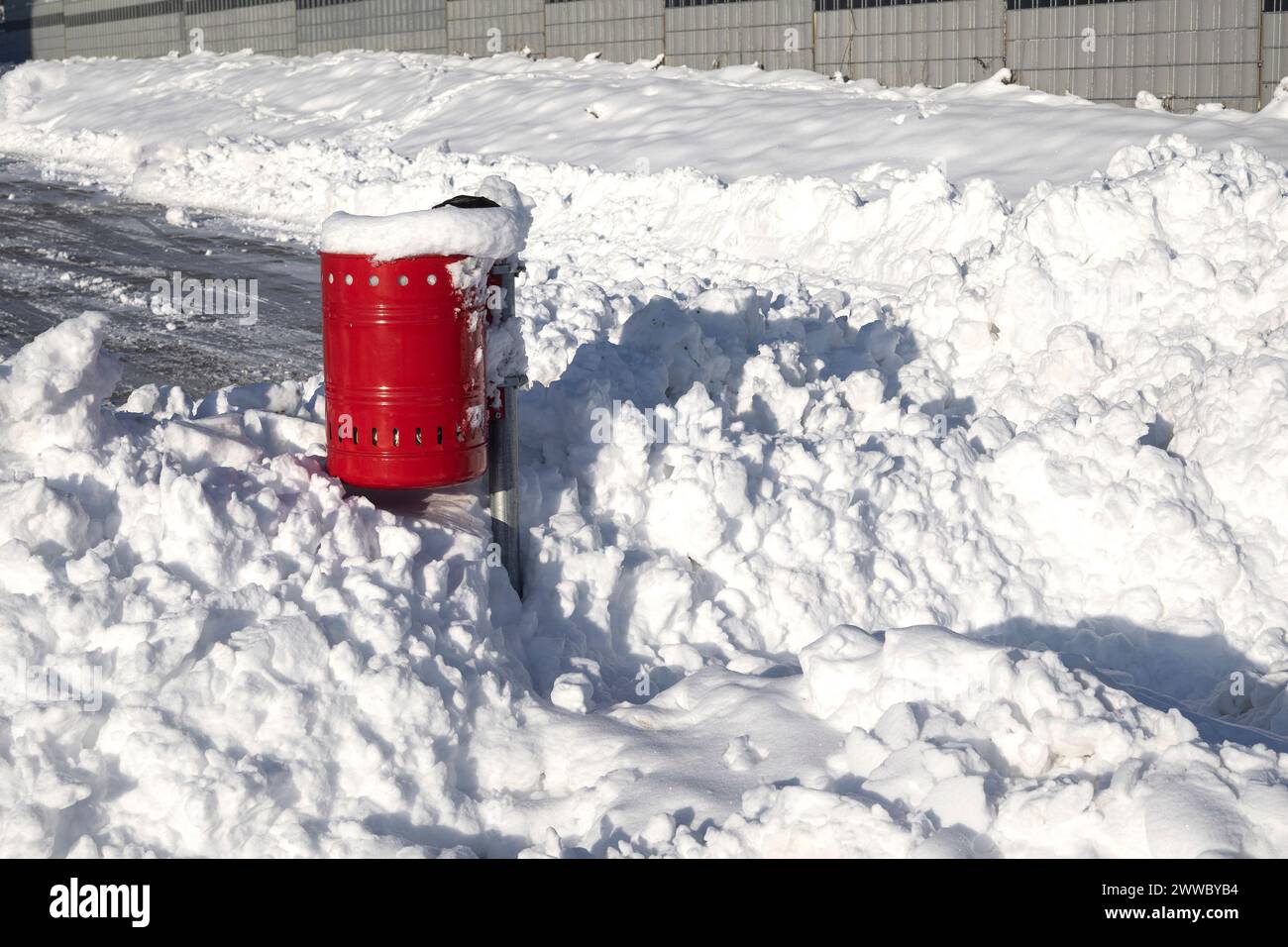 Garbage Bin In The Snow Stock Photo
