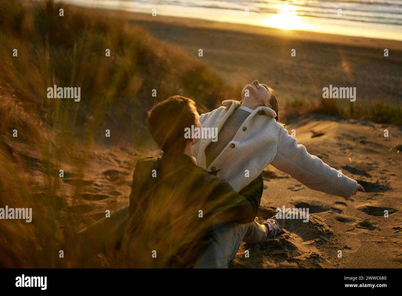 Young couple spending leisure time at beach Stock Photo