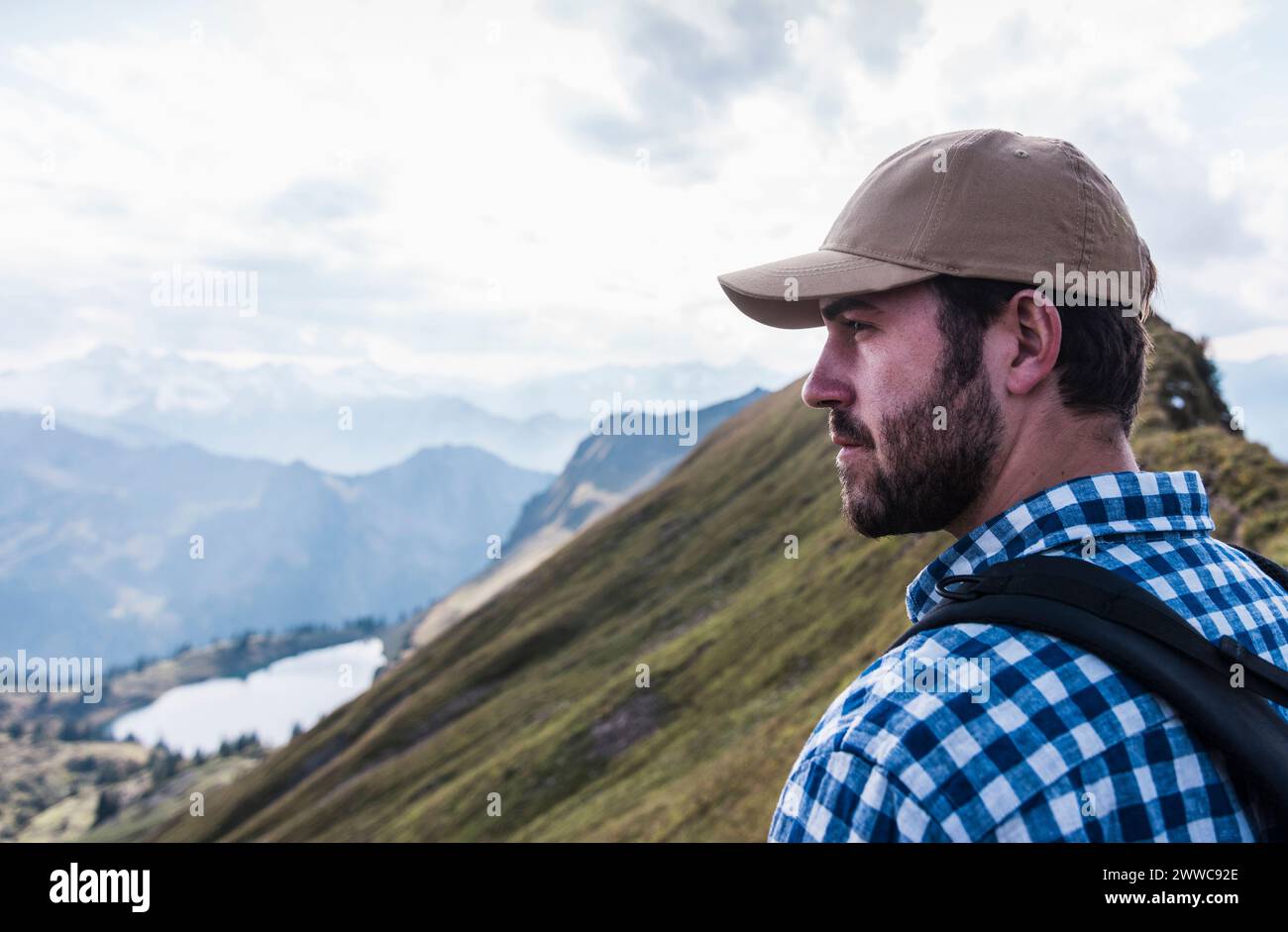 Man hiking on mountain in Bavarian Alps, Germany Stock Photo