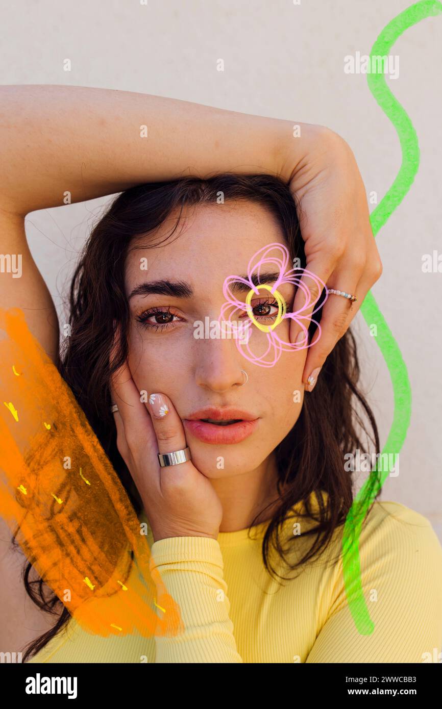 Young woman with doodles near face against white background Stock Photo