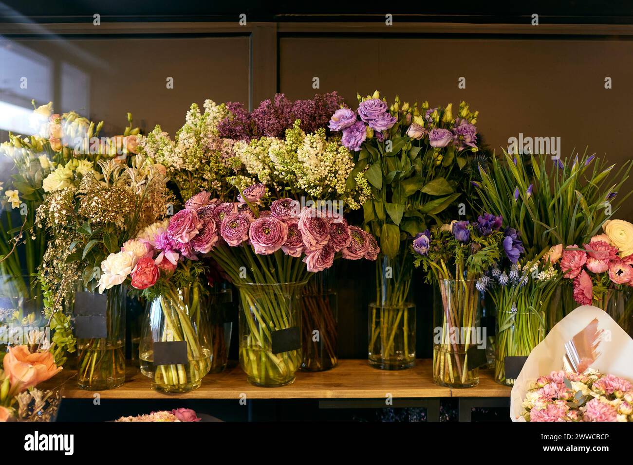 Various flowers on table at flower shop Stock Photo