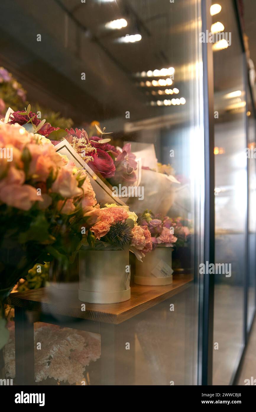Various flowers in cold storage at shop Stock Photo