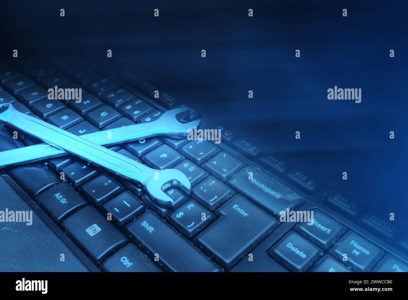 Electronic technical support concept. Wrenches Stock Photo