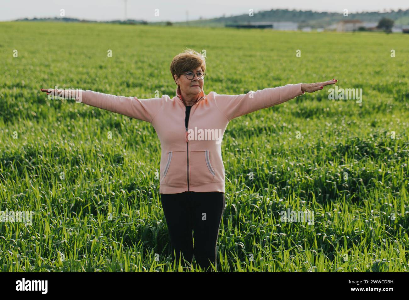 Woman elderly arms in front of hi-res stock photography and images - Alamy
