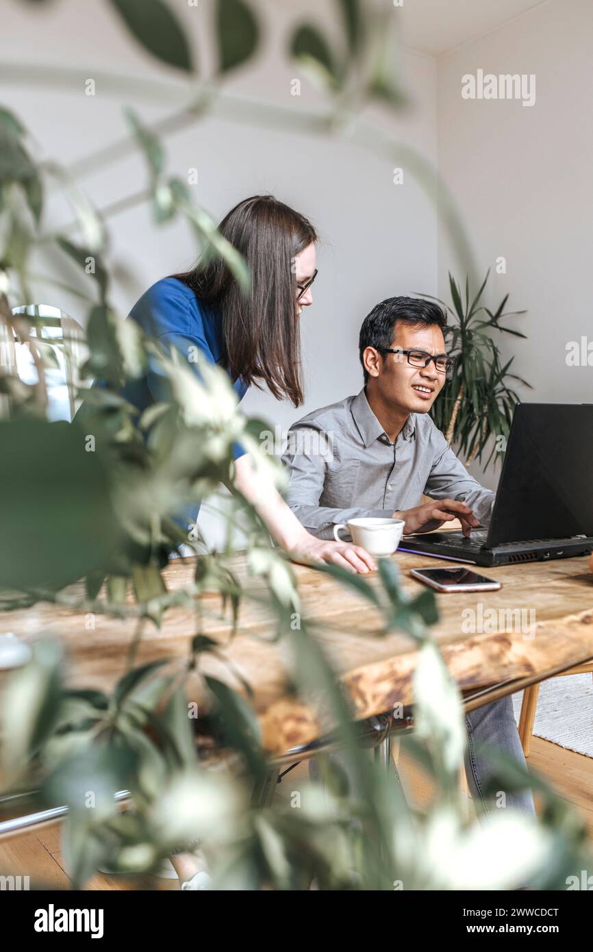 Diverse IT technicians working at startup in office Stock Photo