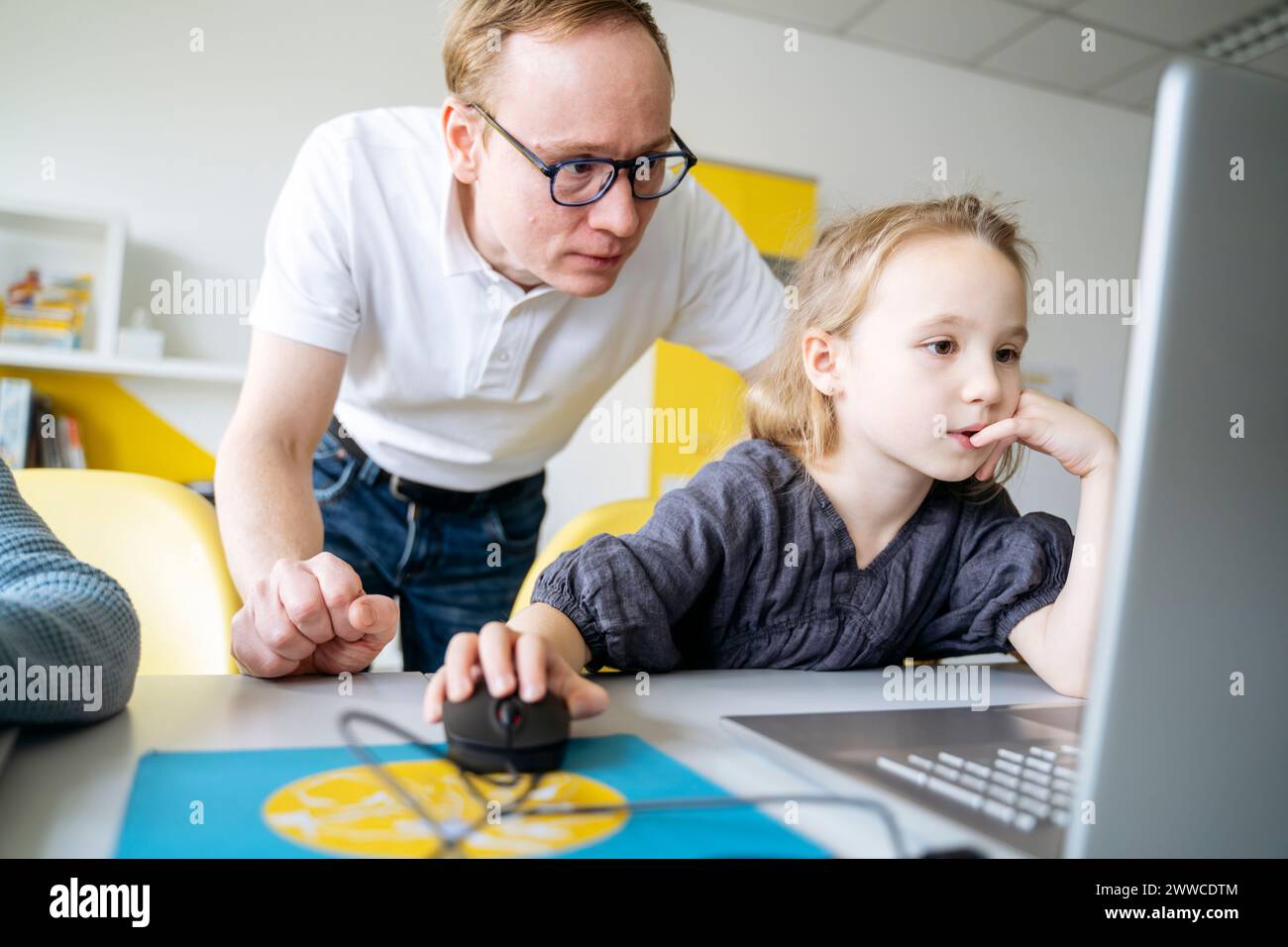 In school children using laptops hi-res stock photography and images ...