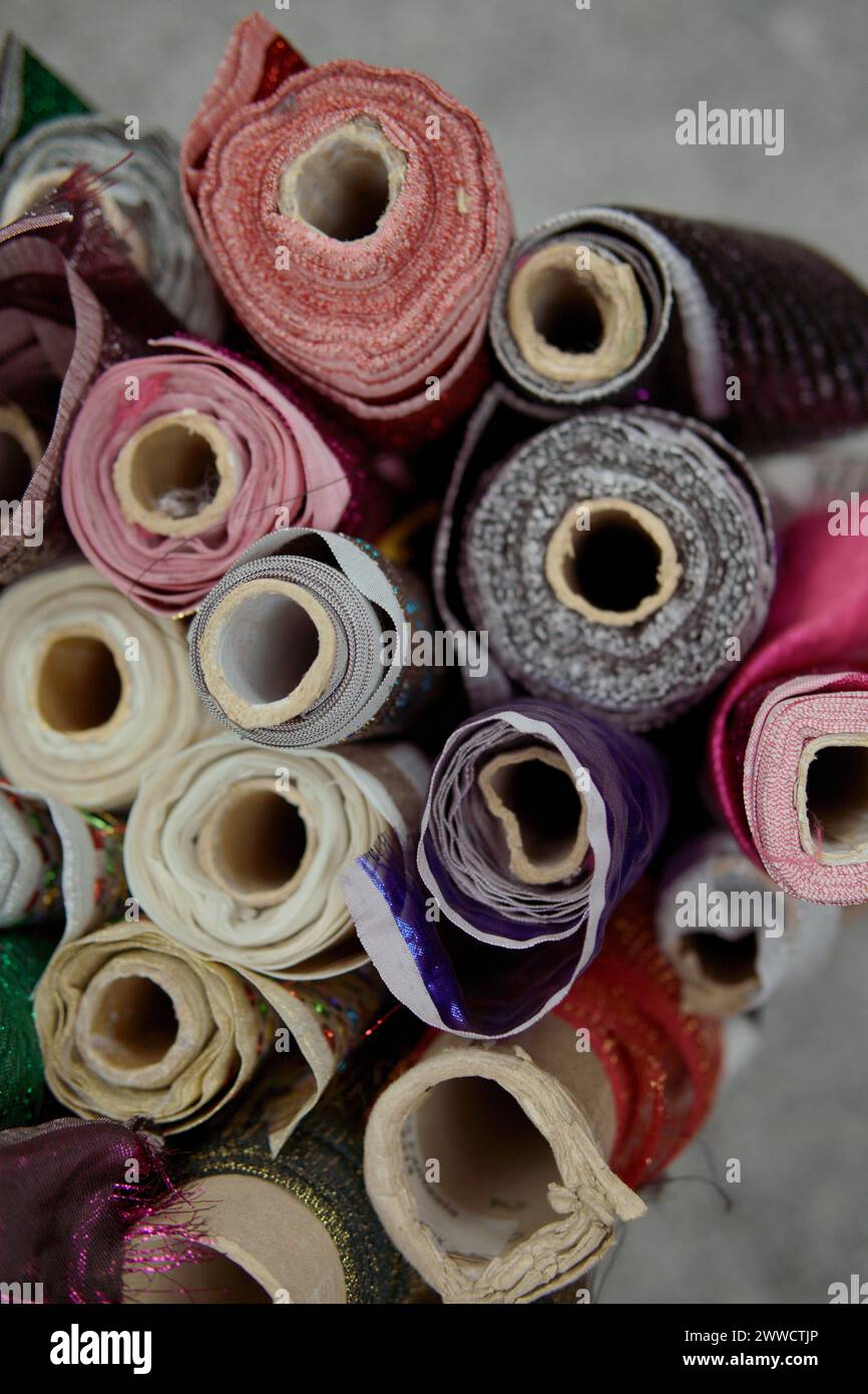 colorful fabric roll with isolated. women's skirts with various colors Stock Photo