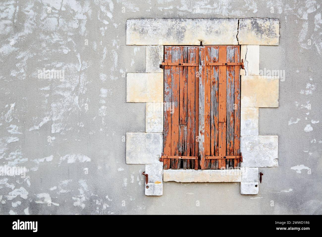 Closed Window Shutters with Peeling Red Paint Stock Photo - Alamy
