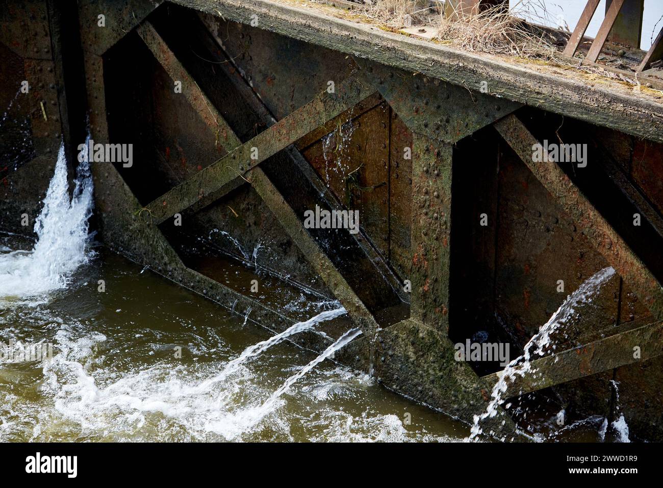 Water Leaking Through Canal Lock Door Stock Photo
