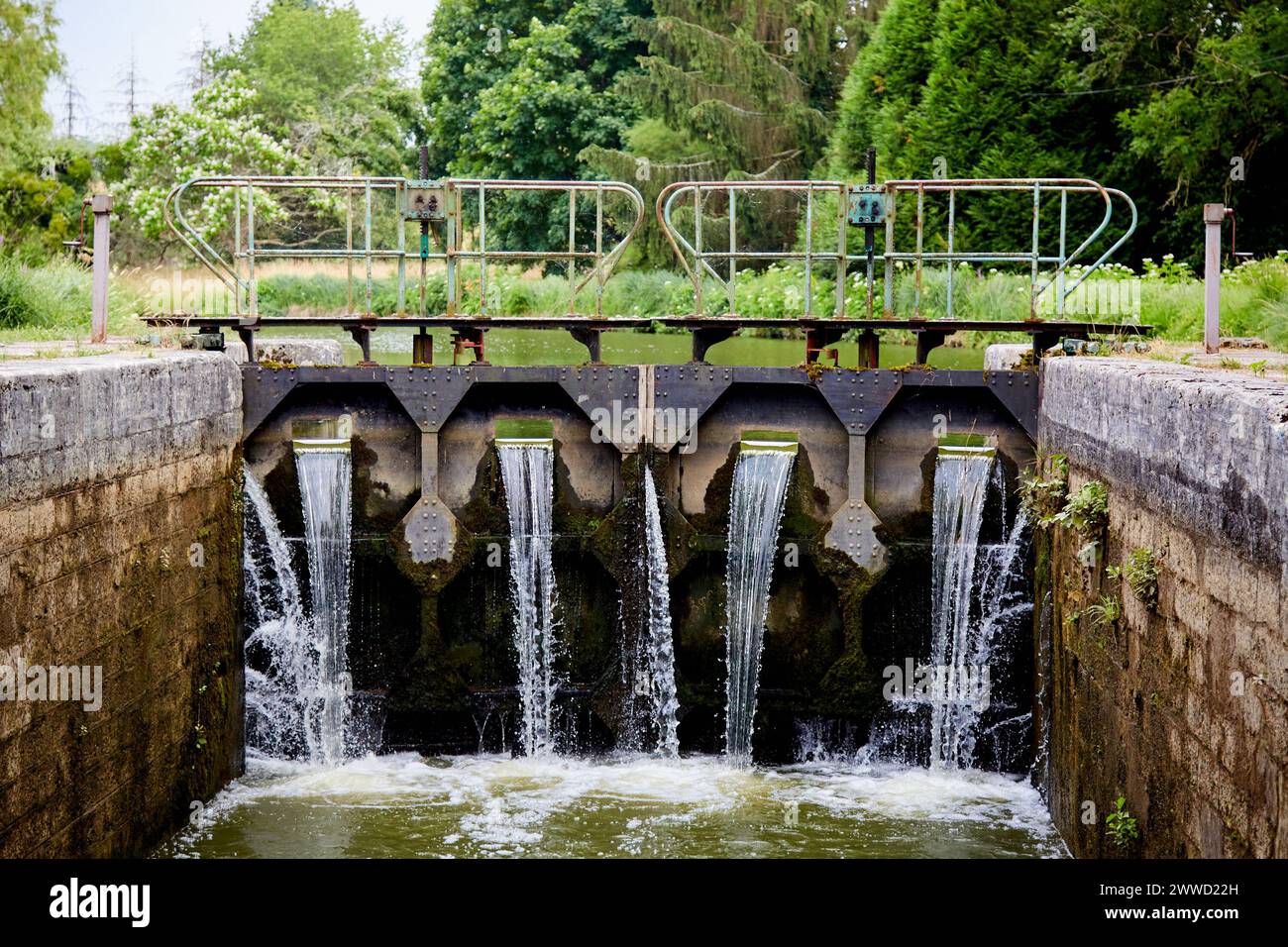 Water Rushing into a Canal Lock on the Yonne River Stock Photo